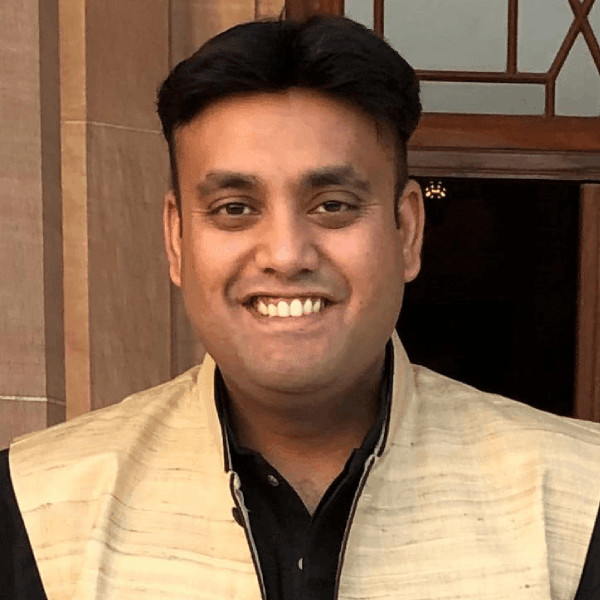 Portrait of Arijit Sarkar, Convenor of the Bhog & Souvenir Committee at HCAF